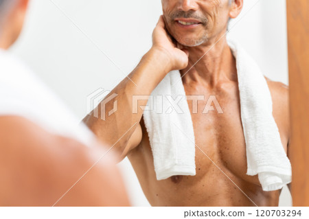 Man looking in the mirror Beauty Hands Man looking in the mirror Beauty Hands 120703294