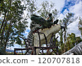 A giant dinosaur eating a giant crocodile 120707818