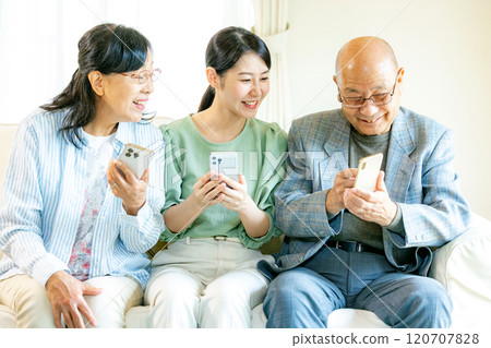 Parent and child smartphone family image 120707828