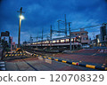 train running at dusk 120708329