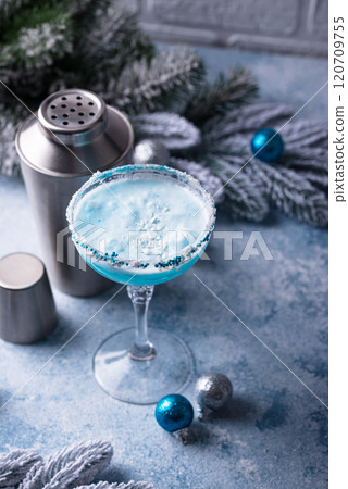 Christmas cocktail with blue curacao Christmas cocktail with blue curacao 120709755