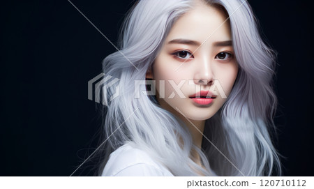 Portrait of smiling asian teenager girl with long and white hair blue background. 120710112