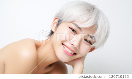 Portrait of smiling asian teenager girl with short haircut and white hair white background. 120710123