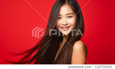 Portrait of smiling asian teenager girl red background. 120710263