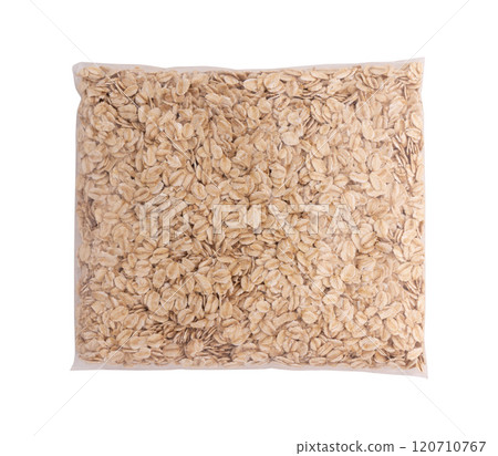 dry rolled oatmeal isolated on white dry rolled oatmeal isolated on white 120710767