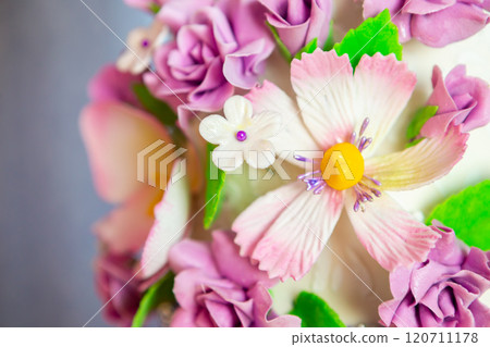 wedding cake decoration. beautiful wedding cake with purple orchids. cake in violet tones wedding cake decoration. beautiful wedding cake with purple orchids. cake in violet tones 120711178