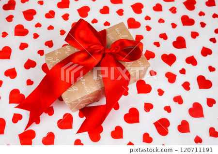 Valentine's Day. Presented as a red ribbon on a white paper with red hearts 120711191