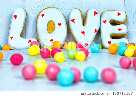 Homemade cookies in the form of a heart or I love you words as a gift to a beloved on Valentine's Day. 120711197