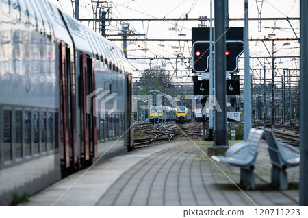 Double deck IC train and platform of the railway station of Leuven, Flemish Brabant Region, Belgium 120711223