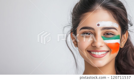 Portrait of a young woman with indian flag face paint for patriotic celebration or event 120711537