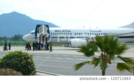 Langkawi, Malaysia, November 4, 2015: Malaysian Government Aircraft Landing at the Airport with VIP Passengers Disembarking 120711863