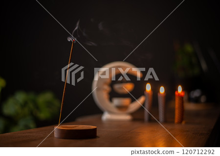 Incense sticks burning with smoke 120712292