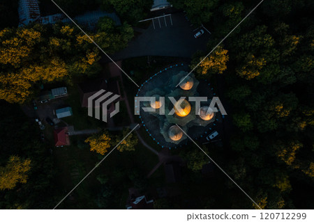 Stunning aerial view captures the architectural beauty of unique domed structures surrounded by lush greenery Stunning aerial view captures the architectural beauty of unique domed structures surrounded by lush greenery 120712299