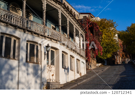 Charming autumn streets of Tbilisi showcasing vibrant colors and historic architecture Charming autumn streets of Tbilisi showcasing vibrant colors and historic architecture 120712341