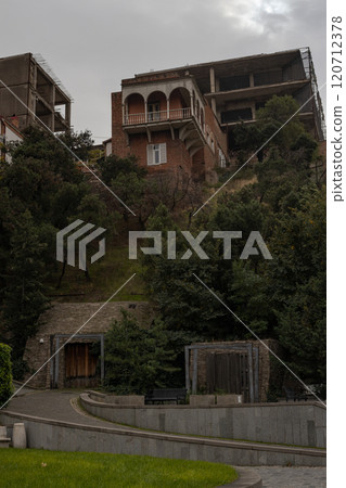 Charming autumn hues paint the lush hills of Tbilisi, revealing architectural beauty and natures embrace Charming autumn hues paint the lush hills of Tbilisi, revealing architectural beauty and natures embrace 120712378