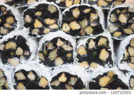 Close-Up of Seaweed Wraps Filled with Nutty Ingredients 120712503