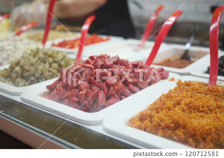 A Colorful and Diverse Variety of Fresh Ingredients Expertly Arranged in a Deli Display A Colorful and Diverse Variety of Fresh Ingredients Expertly Arranged in a Deli Display 120712581