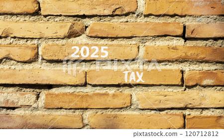 Planning 2025 tax new year symbol. Concept words 2025 Tax on beautiful brown brick wall. Beautiful brown brick wall background. Business 2025 tax new year concept. Copy space. Planning 2025 tax new year symbol. Concept words 2025 Tax on beautiful brown brick wall. Beautiful brown brick wall background. Business 2025 tax new year concept. Copy space. 120712812