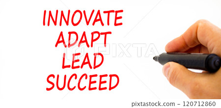 Innovate adapt lead succeed symbol. Concept words Innovate Adapt Lead Succeed on beautiful paper. Beautiful white background. Businessman hand. Business innovate adapt lead succeed concept Copy space 120712860