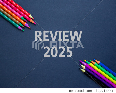 Planning review 2025 new year symbol. Concept words Review 2025 on beautiful black paper. Beautiful black paper background. Beautiful colored pencils Business review 2025 new year concept. Copy space. 120712873