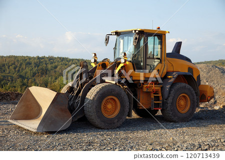 Heavy-Duty Front Loader at Construction Site Heavy-Duty Front Loader at Construction Site 120713439
