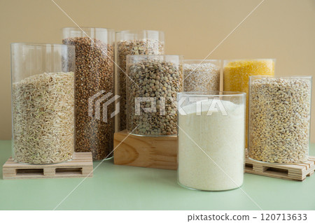 Set of Raw porridges in sustainable packaging. Refillable systems of packaging. Gluten free cereals. Health gut benefits. Concept of alternative whole spelt grain ingredient. Vegetarian diet recipes. Set of Raw porridges in sustainable packaging. Refillable systems of packaging. Gluten free cereals. Health gut benefits. Concept of alternative whole spelt grain ingredient. Vegetarian diet recipes. 120713633