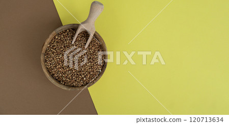 Raw buckwheat porridge Gluten free cereals. Health gut benefits. Concept of alternative whole spelt grain ingredient. Vegetarian diet recipes. Plant-based lifestyle. Copy space Protein rich 120713634