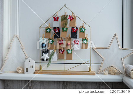 Step by step instruction of making handmade Christmas advent calendar. Creative craft homemade decor. New year celebration. Winter 120713649