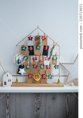 Traditional twenty four days advent calendar before Christmas holidays. Plastic free zero waste sustainable decoration. Winter cozy home Catholic traditions of Christmas countdown new year 120713651