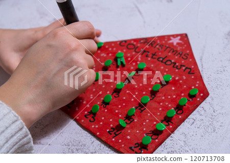 Wooden Christmas advent calendar house Sustainable preparation Diy process of making handmade decoration. Step by step activity for children. Inclusive and responsible stress relief holiday hobby Wooden Christmas advent calendar house Sustainable preparation Diy process of making handmade decoration. Step by step activity for children. Inclusive and responsible stress relief holiday hobby 120713708