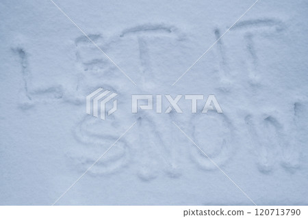 LET IT SNOW text handwritten in snowy winter season surface. Freezing cold weather. Climate change challenging conditions LET IT SNOW text handwritten in snowy winter season surface. Freezing cold weather. Climate change challenging conditions 120713790