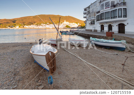 Traditional Boat on the Shore in Cadaques, Spain with Coastal View 120715559