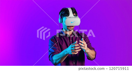 Person moves in a virtual reality with a virtual reality headset on the head, experience of artificial realities for art, science and entertainment Person moves in a virtual reality with a virtual reality headset on the head, experience of artificial realities for art, science and entertainment 120715911