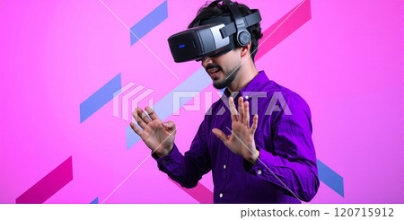 Person moves in a virtual reality with a virtual reality headset on the head, experience of artificial realities for art, science and entertainment Person moves in a virtual reality with a virtual reality headset on the head, experience of artificial realities for art, science and entertainment 120715912