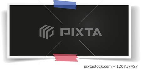 Blank instant photo frame is being attached with two pieces of adhesive tape to a white background, creating a simple yet effective way to display memories or important information 120717457