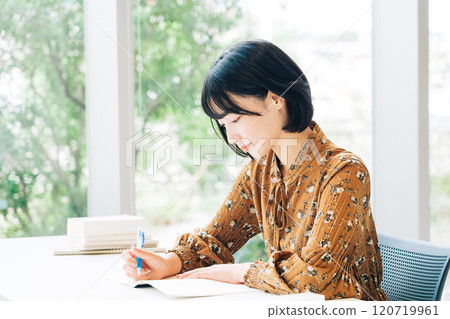 University students attending a lecture 120719961