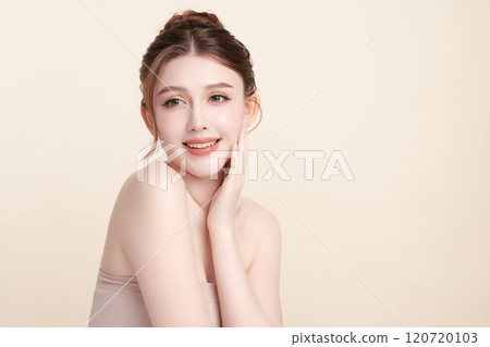 Beautiful young asian woman with clean fresh skin on beige background, Face care, Facial treatment, Cosmetology, beauty and spa, Asian women portrait. Beautiful young asian woman with clean fresh skin on beige background, Face care, Facial treatment, Cosmetology, beauty and spa, Asian women portrait. 120720103