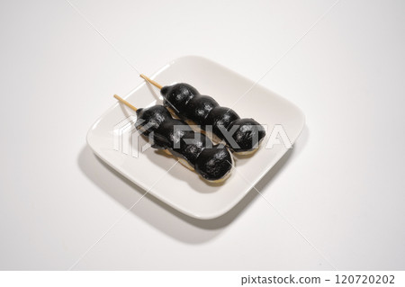 Black sesame paste rice dumplings on a plate 120720202