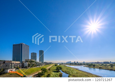 Tokyo cityscape in Japan in November. View of Tama River and tower apartment complexes in front of Musashi-Kosugi Station. A ray of hope... = 22nd 120721267