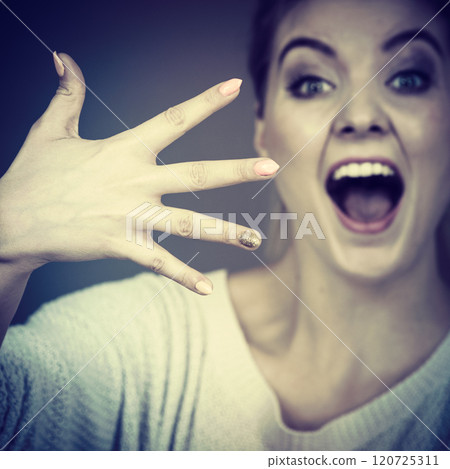 Happy woman showing her hand 120725311