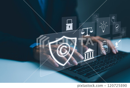 Digital copyright protection concept. Hand typing on laptop with digital icons representing copyright, intellectual property, patent, and security, protecting digital assets and information. trademark Digital copyright protection concept. Hand typing on laptop with digital icons representing copyright, intellectual property, patent, and security, protecting digital assets and information. trademark 120725890