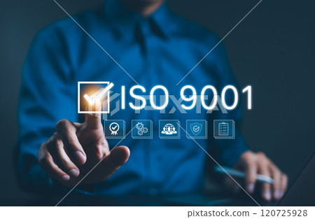 ISO 9001 Certification Concept. Businessman points to ISO 9001 with checkmark icons and quality control symbols, certification, and standardization in quality management. standard quality, certificate ISO 9001 Certification Concept. Businessman points to ISO 9001 with checkmark icons and quality control symbols, certification, and standardization in quality management. standard quality, certificate 120725928