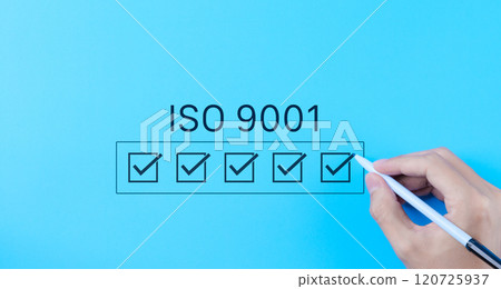 ISO 9001 Quality Assurance Checklist Concept. Hand marking checkboxes for ISO 9001 certification on blue background, symbolizing quality management and assurance standards. Quality control processes, ISO 9001 Quality Assurance Checklist Concept. Hand marking checkboxes for ISO 9001 certification on blue background, symbolizing quality management and assurance standards. Quality control processes, 120725937