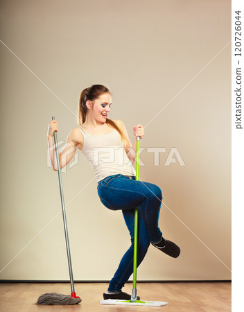 Funny cleaning woman mopping floor dancing Funny cleaning woman mopping floor dancing 120726044