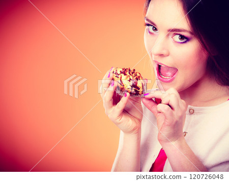 woman holds cake in hand closeup woman holds cake in hand closeup 120726048