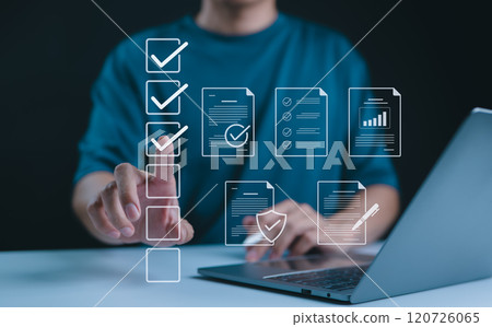 Digital form checklist, Online survey concept. Person interacts with digital form checklist on laptop with process of filling out online survey and completing digital forms with checkbox and document. Digital form checklist, Online survey concept. Person interacts with digital form checklist on laptop with process of filling out online survey and completing digital forms with checkbox and document. 120726065
