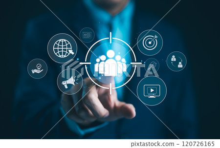 Digital marketing targeting concept. Businessman with marketing icons represent targeting, customer engagement. global reach, Modern strategies in online marketing, customer acquisition, sales growth, 120726165