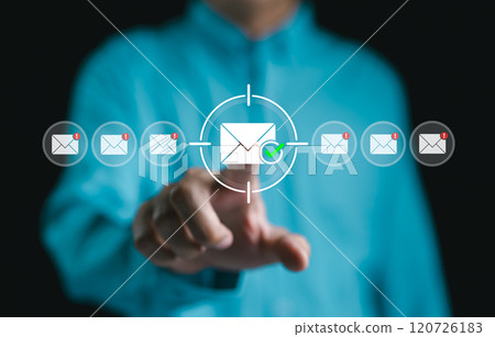 Email marketing and message targeting concept. Businessman interacting with virtual email icons, focusing on targeted email campaigns and notifications for marketing and communication strategies. Mail Email marketing and message targeting concept. Businessman interacting with virtual email icons, focusing on targeted email campaigns and notifications for marketing and communication strategies. Mail 120726183