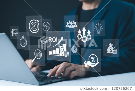 Analyzing ROI and Business Strategy Concepts. Businessman working on a laptop with various digital icons representing ROI, financial strategies, return on investment, and efficiency. marketing plan, 120726267
