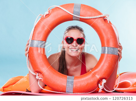 Happy woman in sunglasses with ring buoy lifebuoy. 120726313